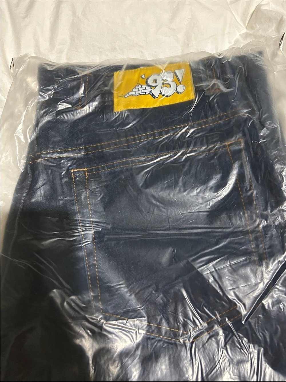 Men's Dark Blue Straight Jeans with Yellow Logo Patch